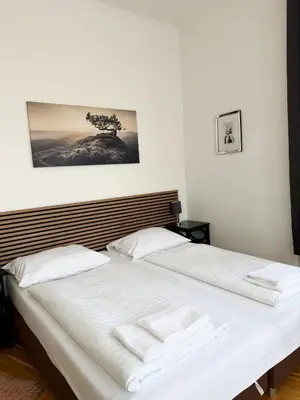 Ein Bett oder Betten in einem Zimmer der Unterkunft Oswald Apartments Vienna