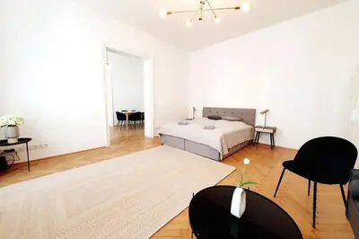 Ein Bett oder Betten in einem Zimmer der Unterkunft Savoir Vivre Apartments Rosinagasse