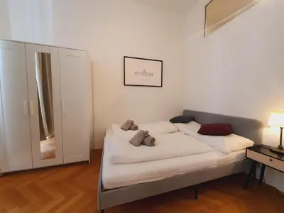 Ein Bett oder Betten in einem Zimmer der Unterkunft Savoir Vivre Apartments Rosinagasse