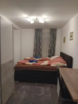 Ein Bett oder Betten in einem Zimmer der Unterkunft Klosterappartment