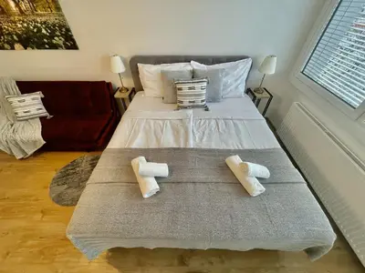 Ein Bett oder Betten in einem Zimmer der Unterkunft City Center Apartments am Schwedenplatz