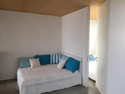 Ein Bett oder Betten in einem Zimmer der Unterkunft Ferienhaus am See Neusiedl