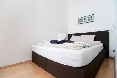 Ein Bett oder Betten in einem Zimmer der Unterkunft Central Apartment Vienna City Center