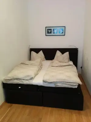 Ein Bett oder Betten in einem Zimmer der Unterkunft Central Apartment Vienna City Center