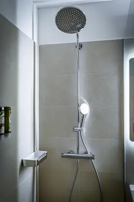 Ein Badezimmer in der Unterkunft The Splash by JR City Apartments