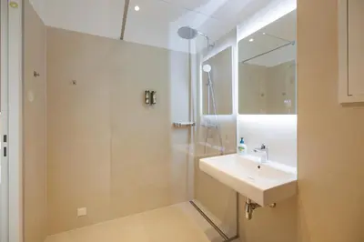Ein Badezimmer in der Unterkunft The Splash by JR City Apartments
